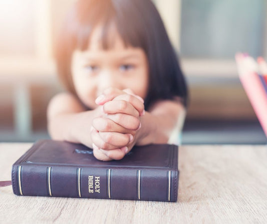 child with a Bible
