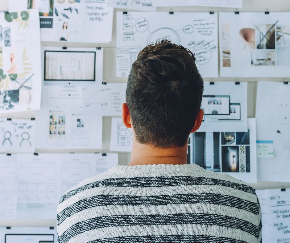 man looking at a planning board - setting a vision for children's minsitry